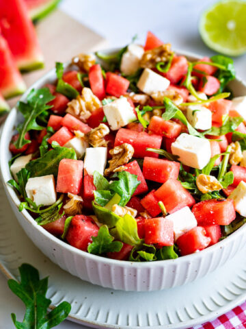 Watermelon feta arugula salad with walnuts.